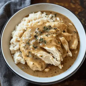 Tender slow-cooked chicken smothered in rich gravy makes this dish a family favorite. With just a few simple ingredients, you can whip up a comforting meal easily. Perfect for busy weeknights or Sunday dinners, this chicken and gravy recipe is sure to impress. Save it now to have on hand for your next cozy gathering!